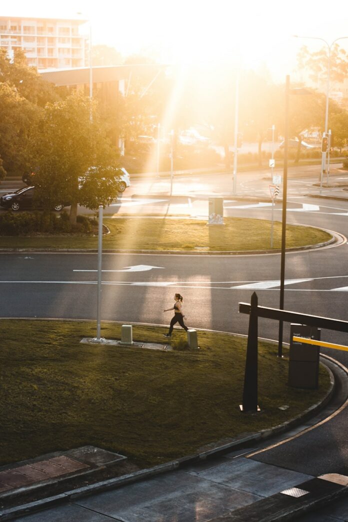 Photo by Justin Clark woman jogging on park during daytime