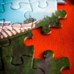 일상 속에서 실천하는 뇌건강, 작지만 확실한 변화 만들기 a piece of a puzzle with a picture of a bridge on it