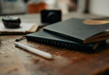 “마음 챙기기, 건강 챙기기”… 일상 속 정신건강 관리법 주목 a couple of books sitting on top of a wooden table