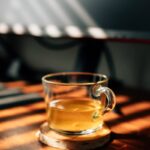 번아웃 시대, 내 삶을 지키는 스트레스 관리법 주목받아 clear glass mug on brown wooden table