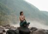 ‘하루 10분 명상’ 열풍…직장인 스트레스 관리에 소확행 찾는다 a woman sitting on top of a rock next to a river