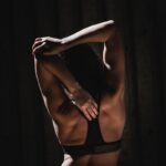 건강한 아침 루틴, 작은 변화가 큰 차이를 만든다 woman wearing black sports bra